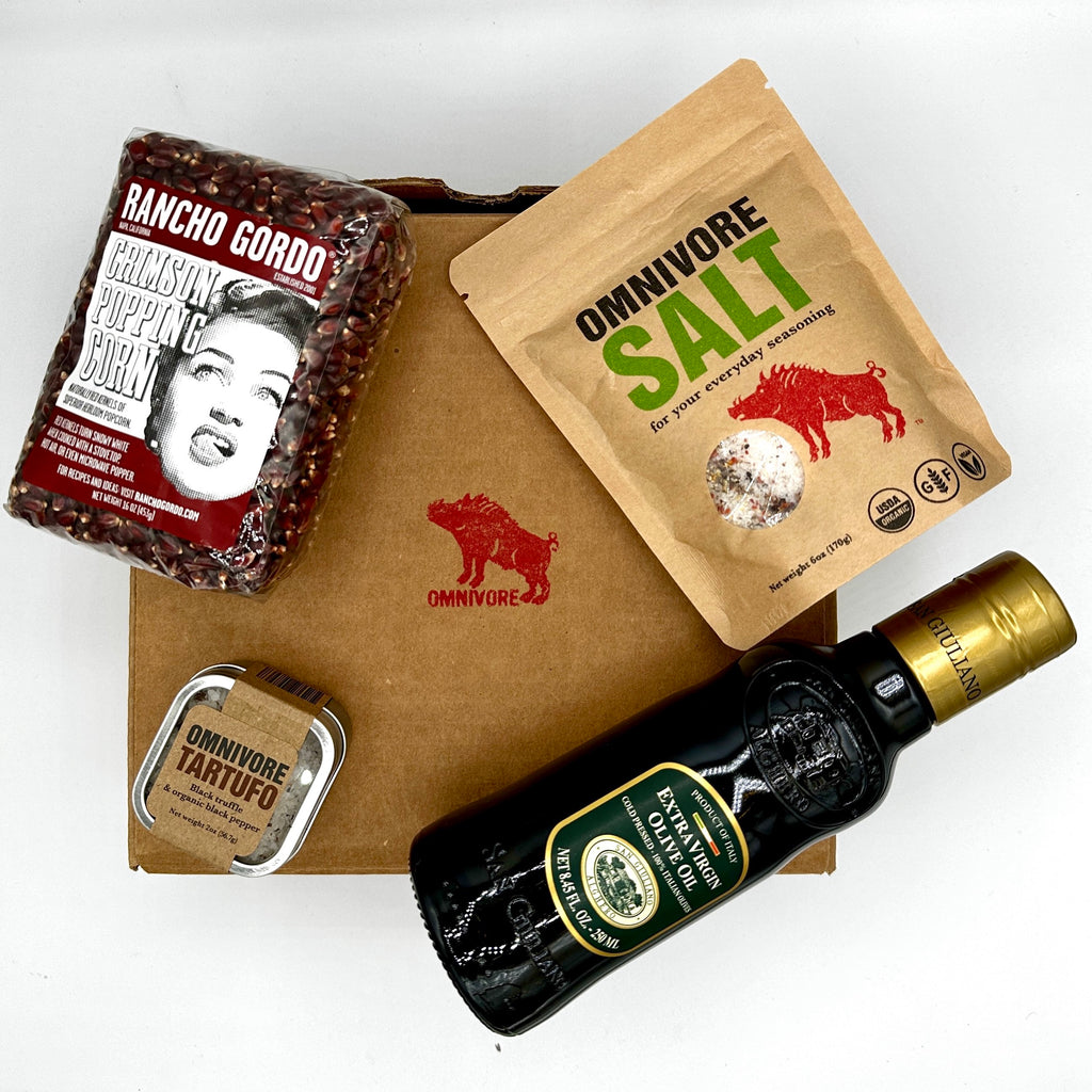 Sitting on top of the Gift Box are the following products; 1- 16 oz bag of Rancho Gordo pop corn, 1- 6 oz bag of Omnivore SALT, 1- 2 oz tin of Omnivore Tartufo, and 1 8.5 fl oz bottle of extra virgin olive oil